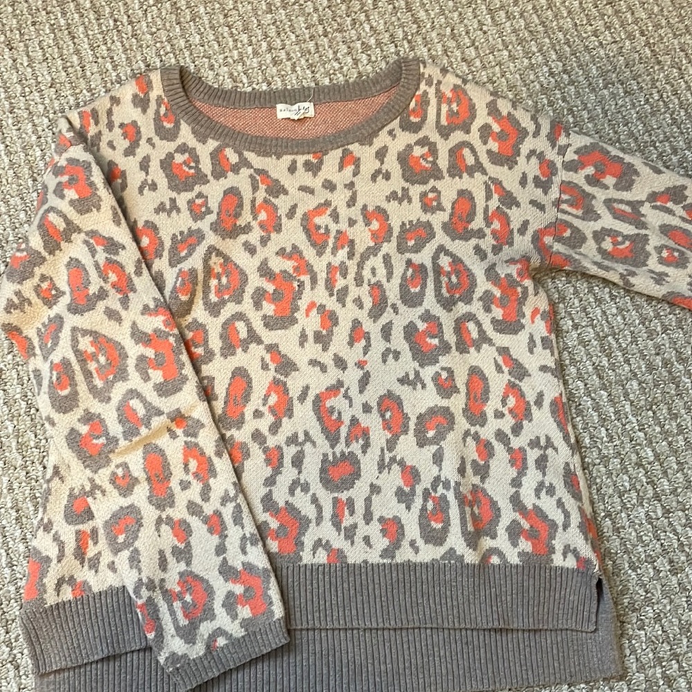 Orange, cream and beige leopard print sweater. Super soft and cozy.